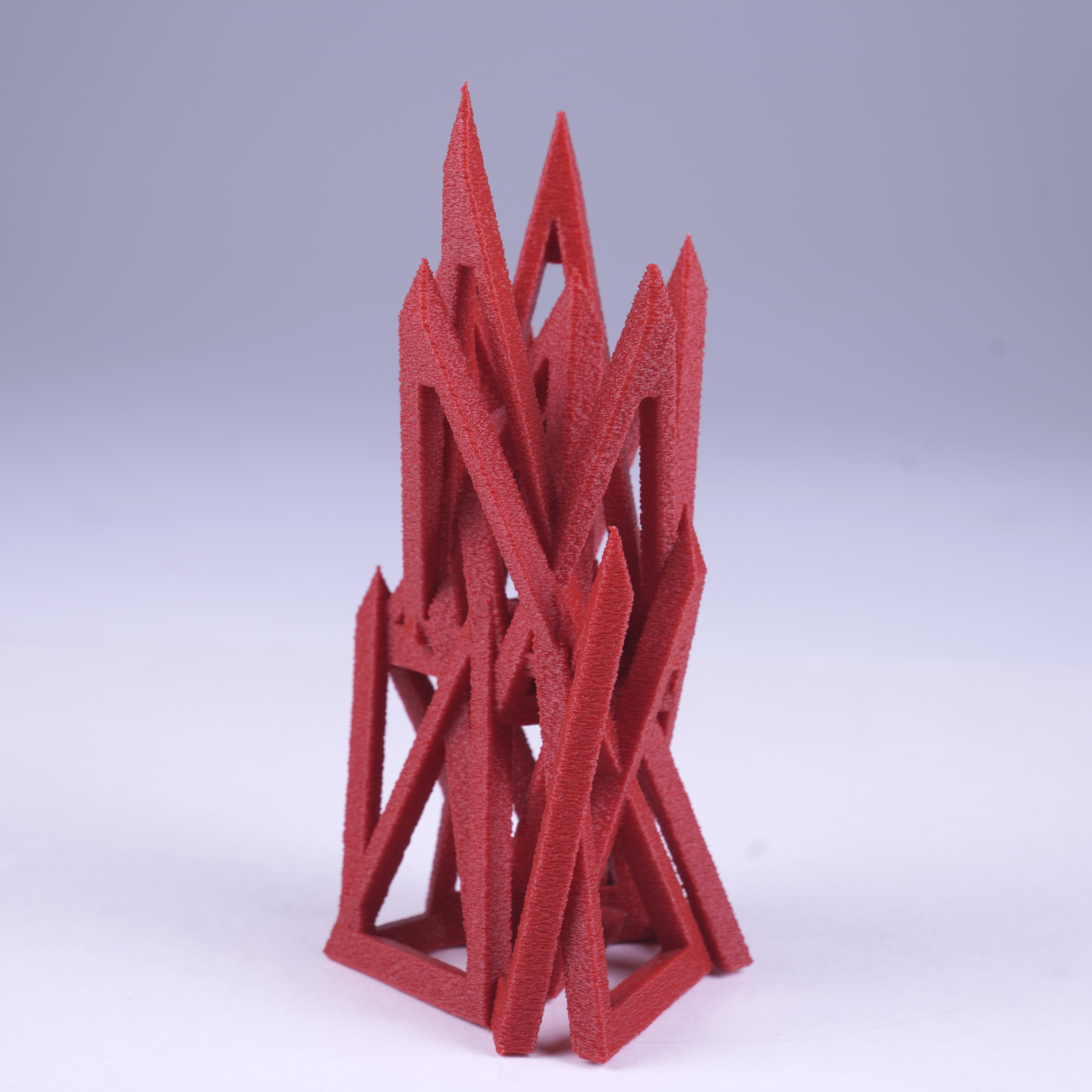 genF1 PETG print from the Generative Fabrication series, ribboned isosurface with cellular cavities